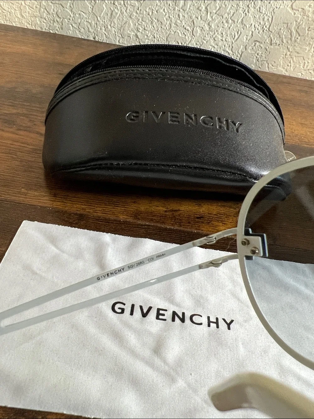 Givenchy Round Metal Sunglasses in Black and Silver